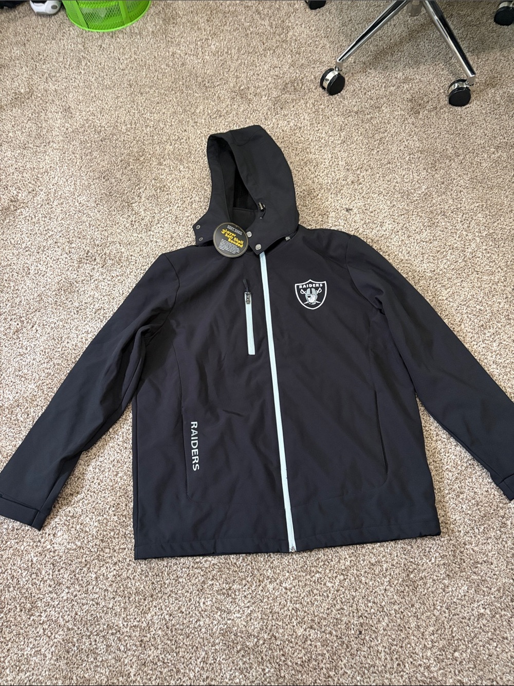 NFL Raiders Men’s Black Hooded Windbreaker Jacket with Silver Accents